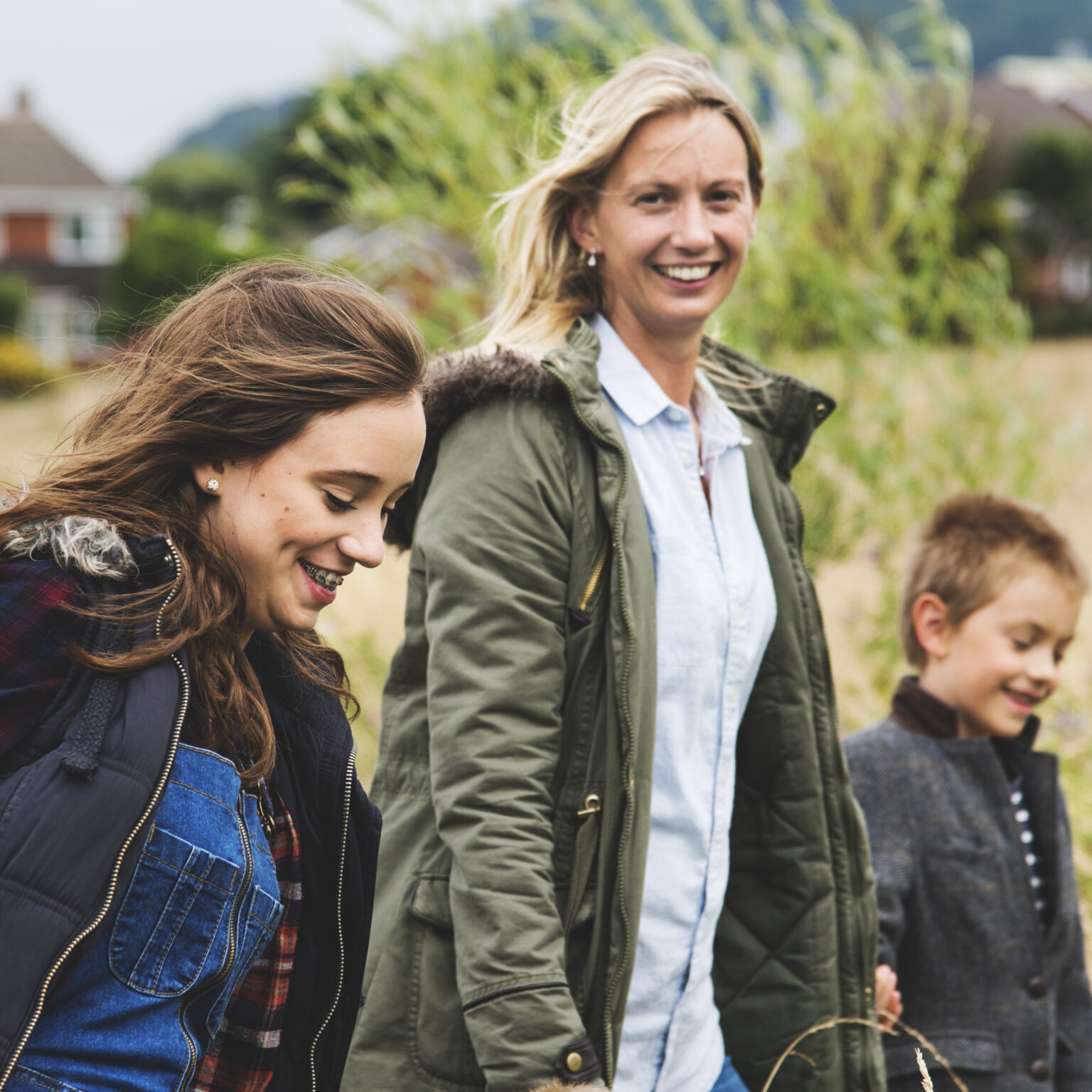 Family Walking Field Nature Togetherness Concept